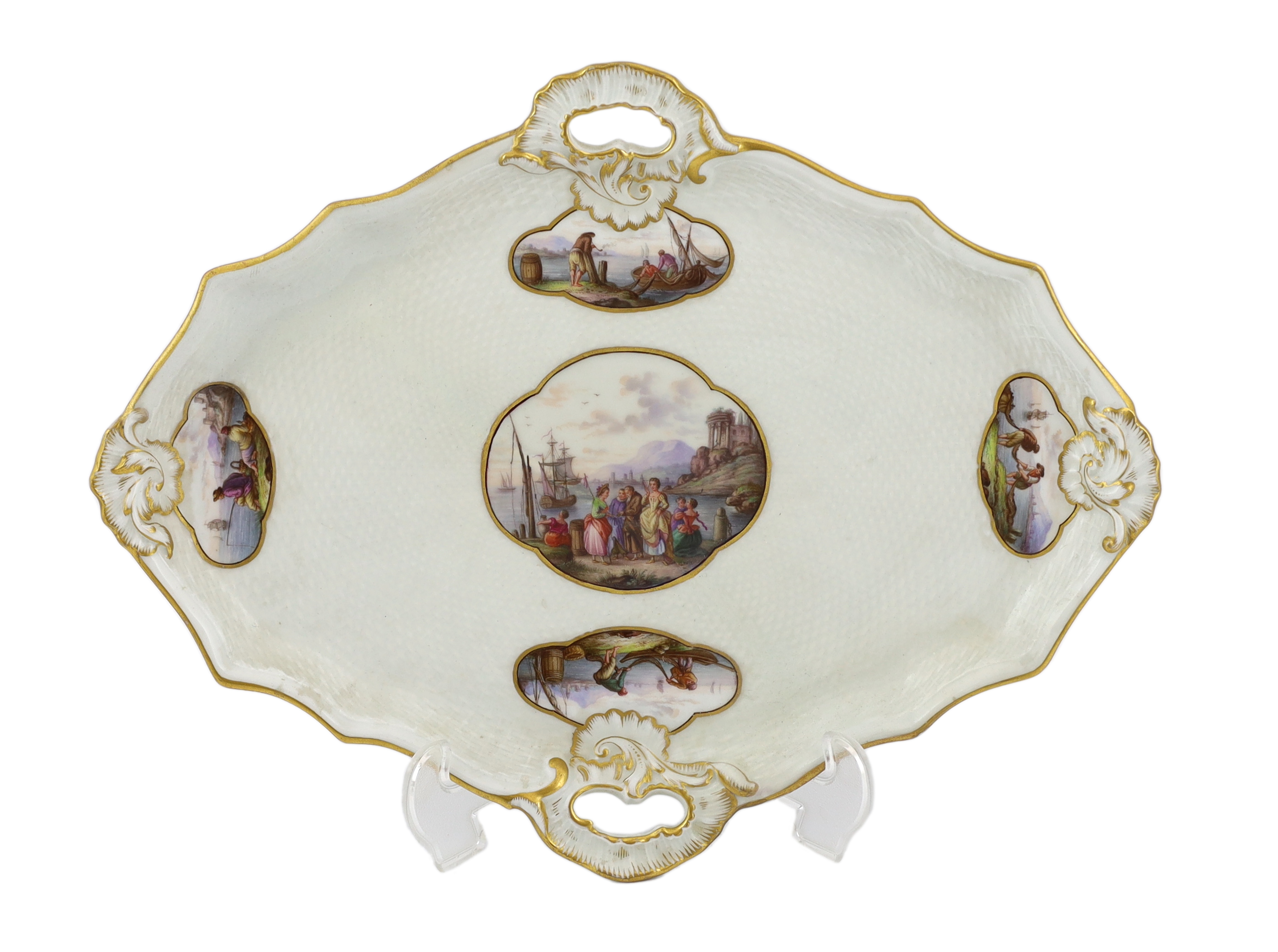 A Meissen porcelain lozenge shaped tray, 19th century, broken and restored